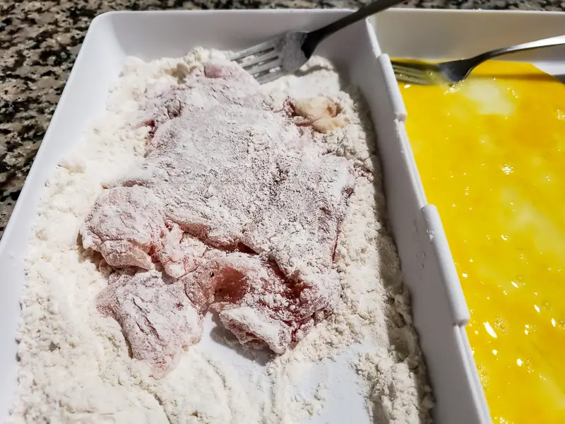 chicken breasts dredged in flour