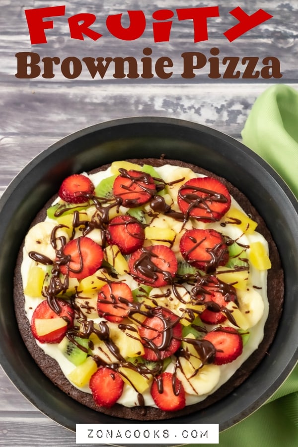 fruity brownie pizza in a pie dish.