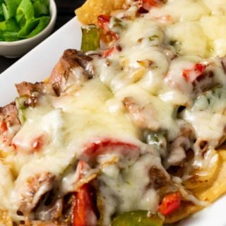 Steak Fajita Nachos on a platter.