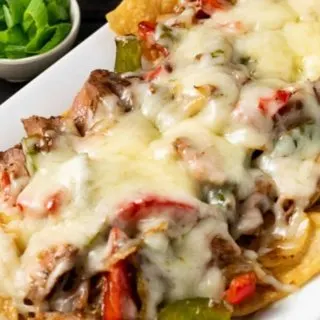 Steak Fajita Nachos on a platter.