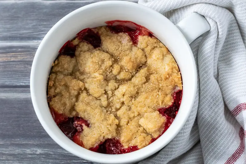 baked strawberry cobbler in a dish.