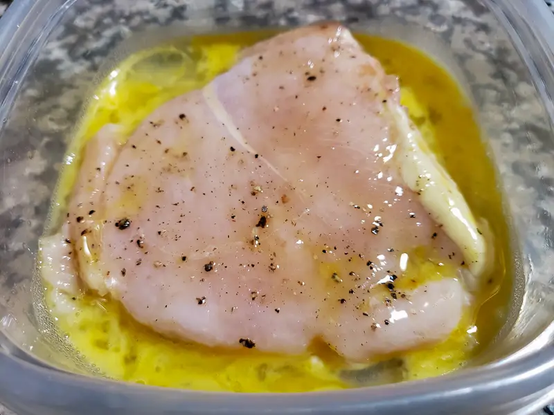 a chicken breast dredged in egg.