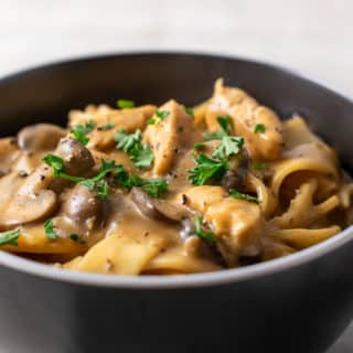chicken stroganoff with mushrooms and parsley.