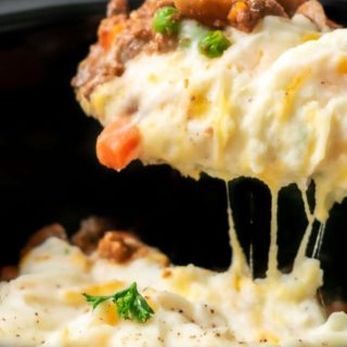 Crockpot Shepherd's Pie with a spoon lifting some out.