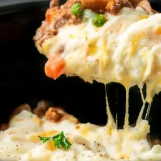 Crockpot Shepherd's Pie with a spoon lifting some out.