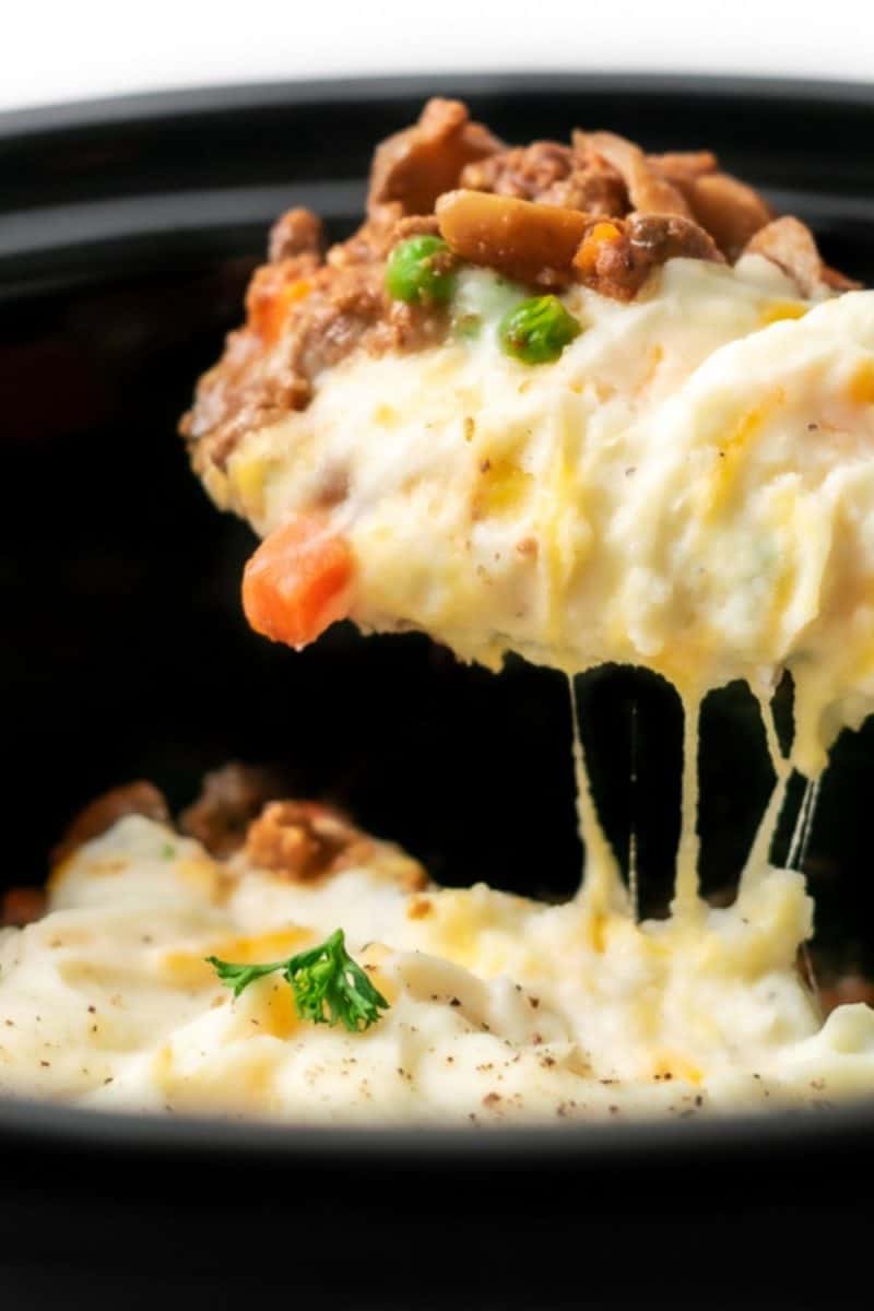 Crockpot Shepherd's Pie with a spoon lifting some out.