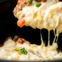 Crockpot Shepherd's Pie with a spoon lifting some out.