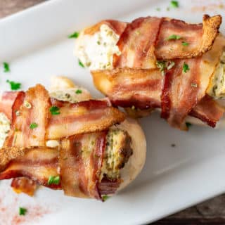 Bacon Wrapped Cream Cheese Chicken on a platter.