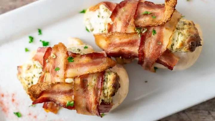 Bacon Wrapped Cream Cheese Chicken on a platter.