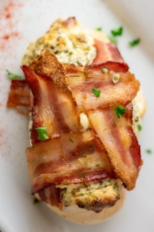 Bacon Wrapped Cream Cheese Chicken on a plate.