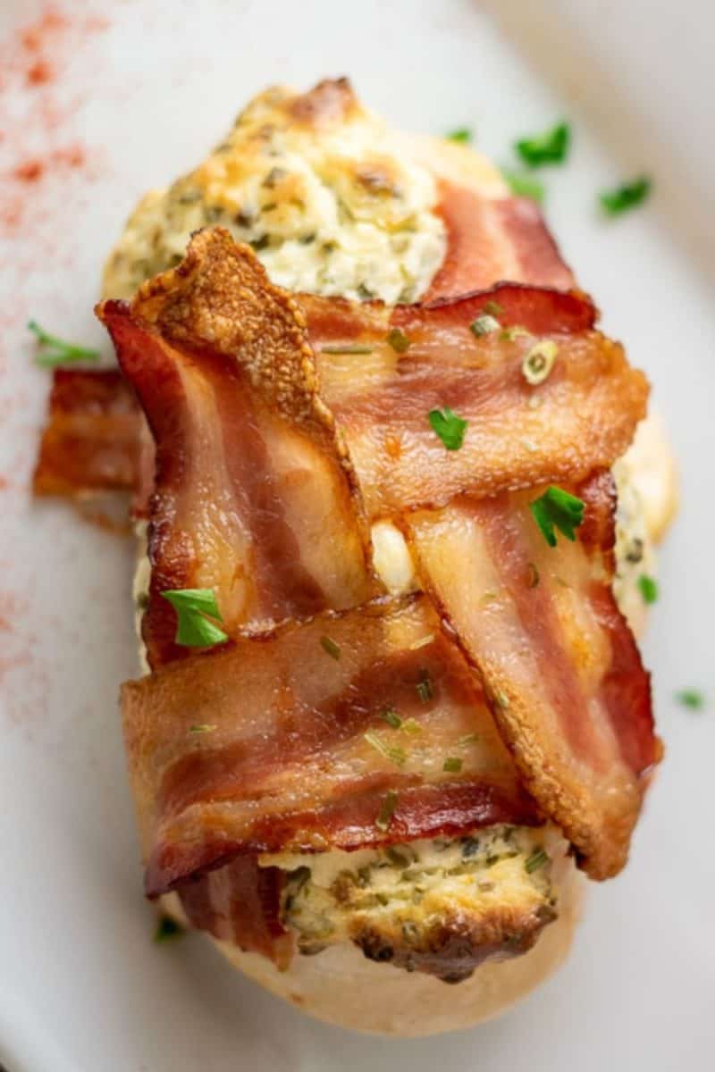 Bacon Wrapped Cream Cheese Chicken on a plate.
