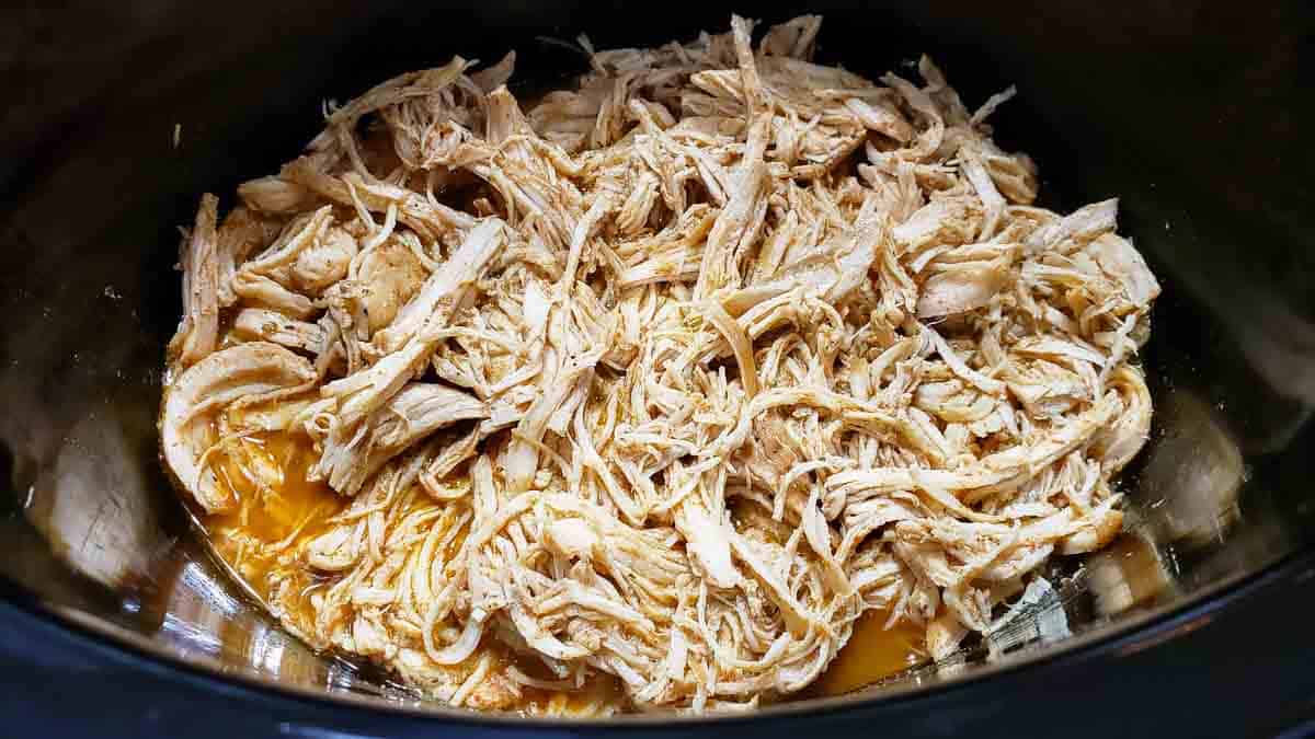 Slow cooker Mexican shredded chicken in a crock pot.