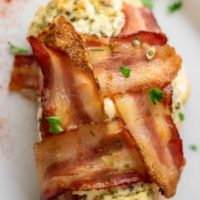 Bacon Wrapped Cream Cheese Chicken on a plate.