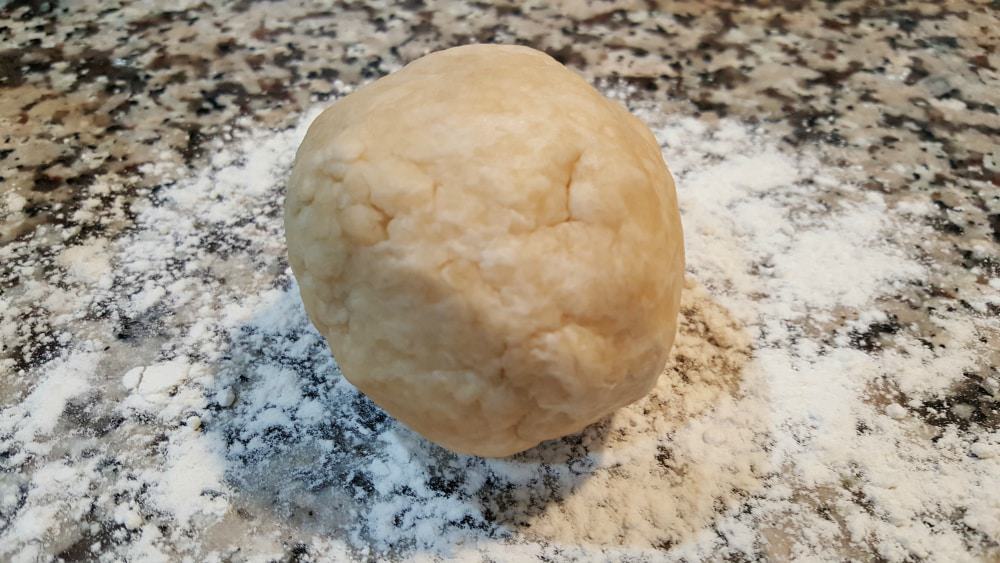 pie crust dough rolled into a ball.