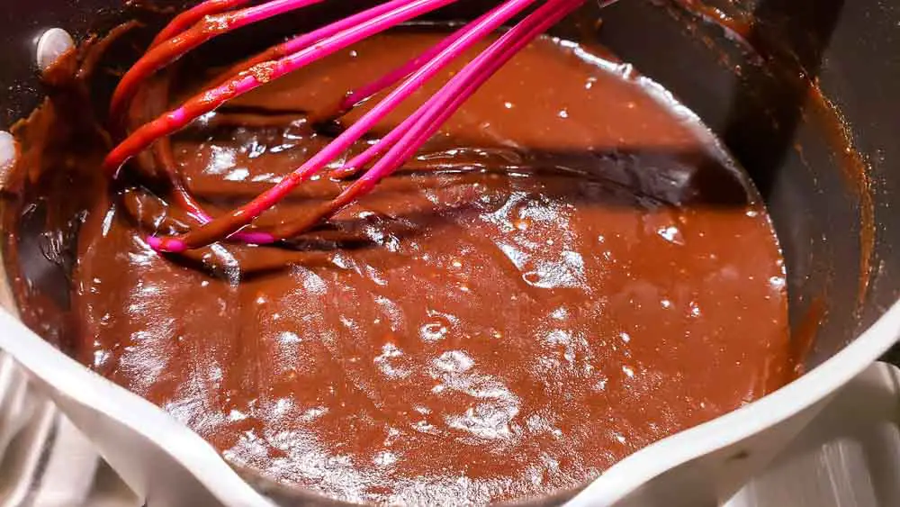 black forest pie filling cooking in a pan.