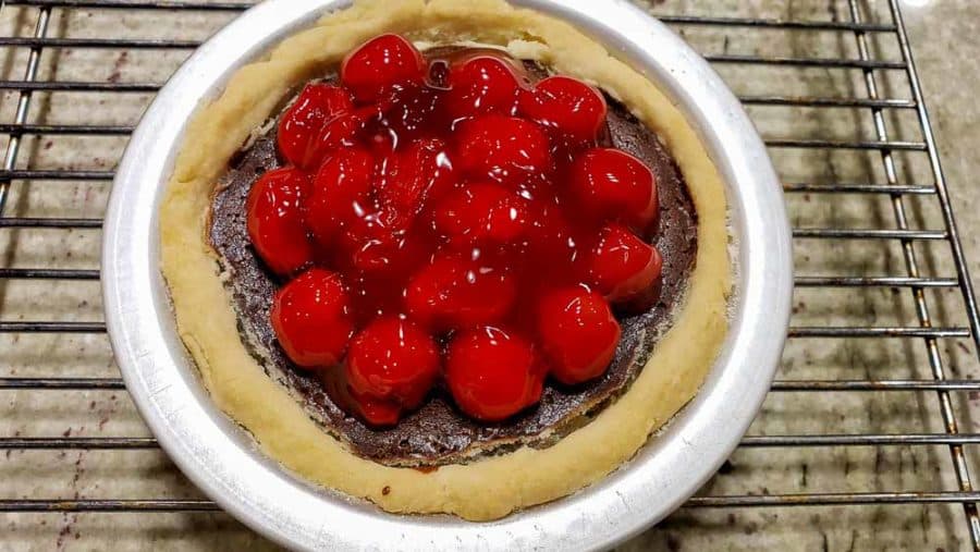 cherry pie filling on top of baked pie