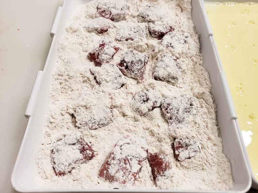 steak cubes dredged in flour mixture