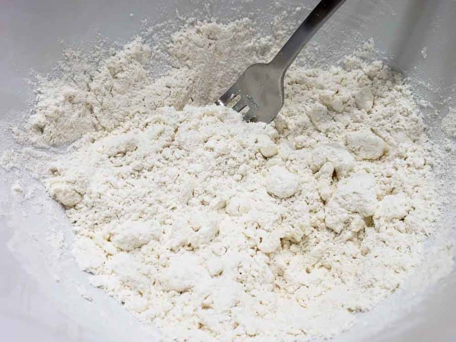 flour mixture with butter cubes mashed in