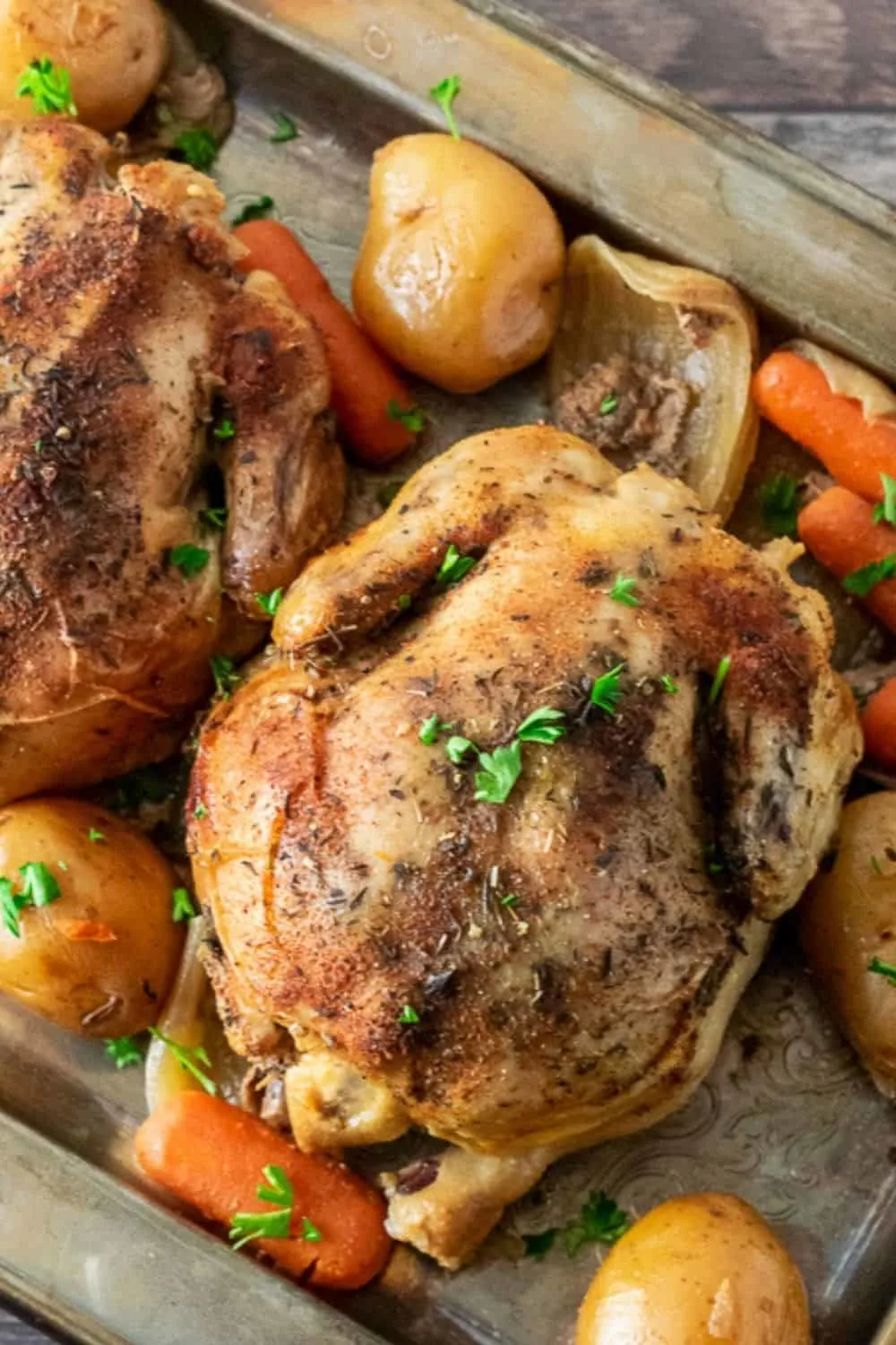 Crockpot Cornish Hens and Veggies on a tray.