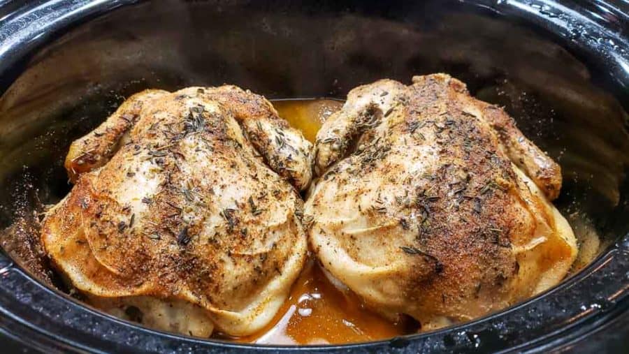 two cornish hens in a crockpot after cooking 8 hours