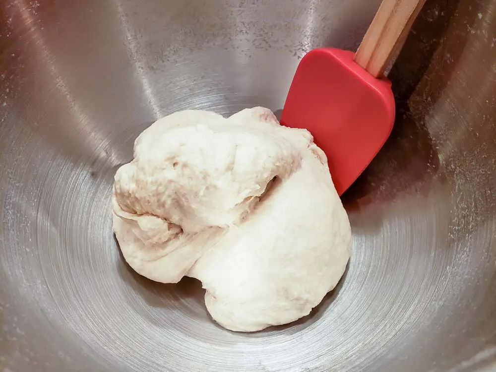 bread dough mixed in a bowl.