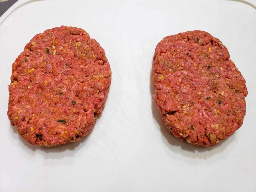 ground beef mixture formed into two ovals