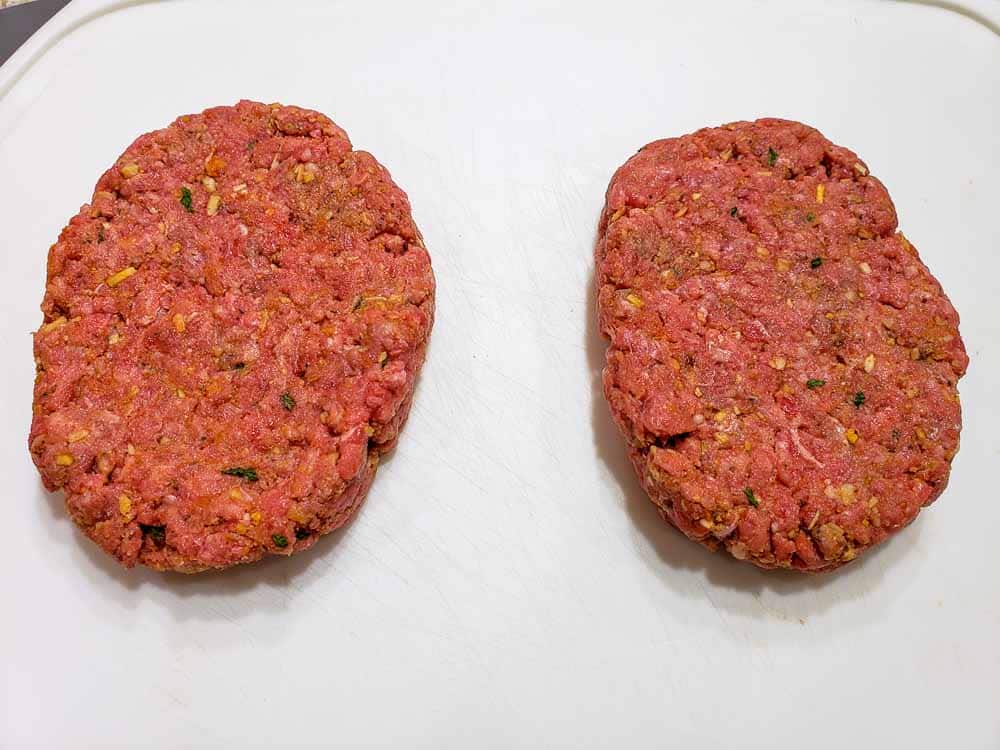 ground beef mixture formed into two ovals.