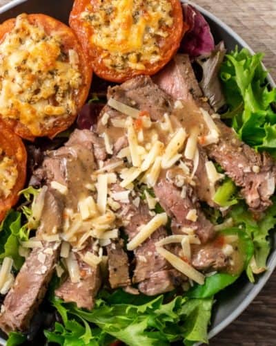 Strip Steak Salad with Parmesan Broiled Tomatoes