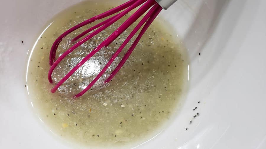 oil whisked into poppy seed dressing