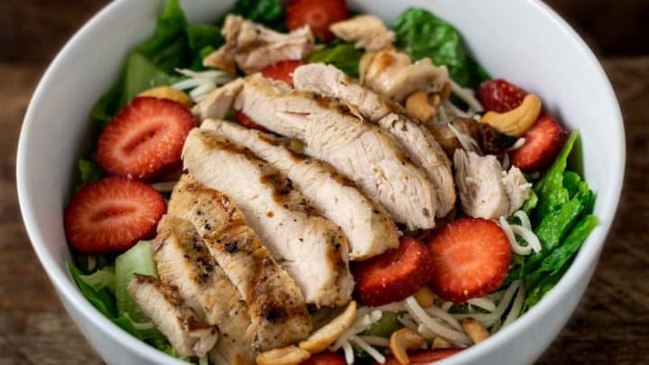 Chicken Strawberry Salad and Poppy Seed Dressing in a bowl