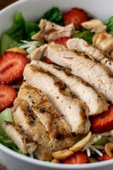 Chicken Strawberry Salad and Poppy Seed Dressing in a bowl.