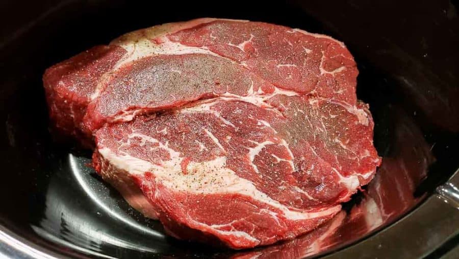 seasoned chuck roast in a crockpot