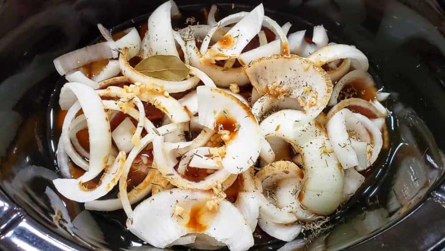 french onion soup, worcestershire, bay leaf, garlic, and thyme added to crockpot