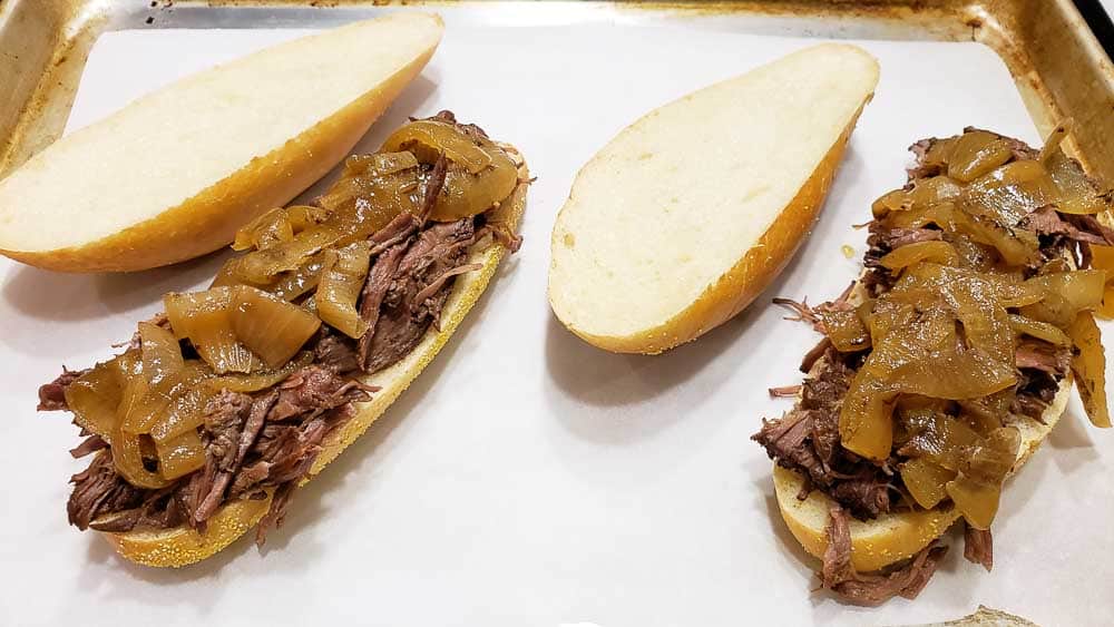 to open-faced French Dip Sandwiches on a baking sheet.
