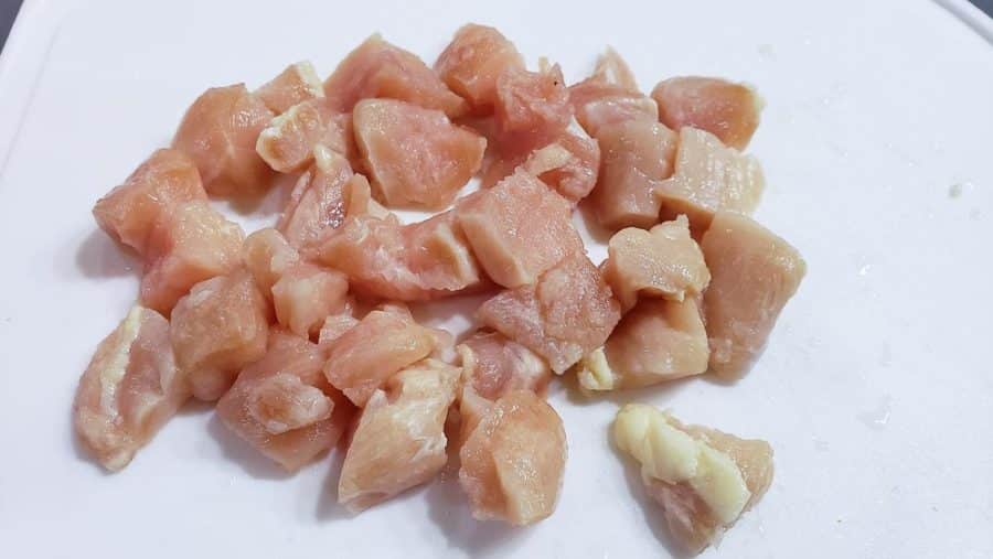 diced chicken on a cutting board