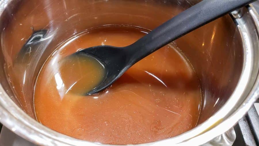 broth and beef bouillon cooking in a pan