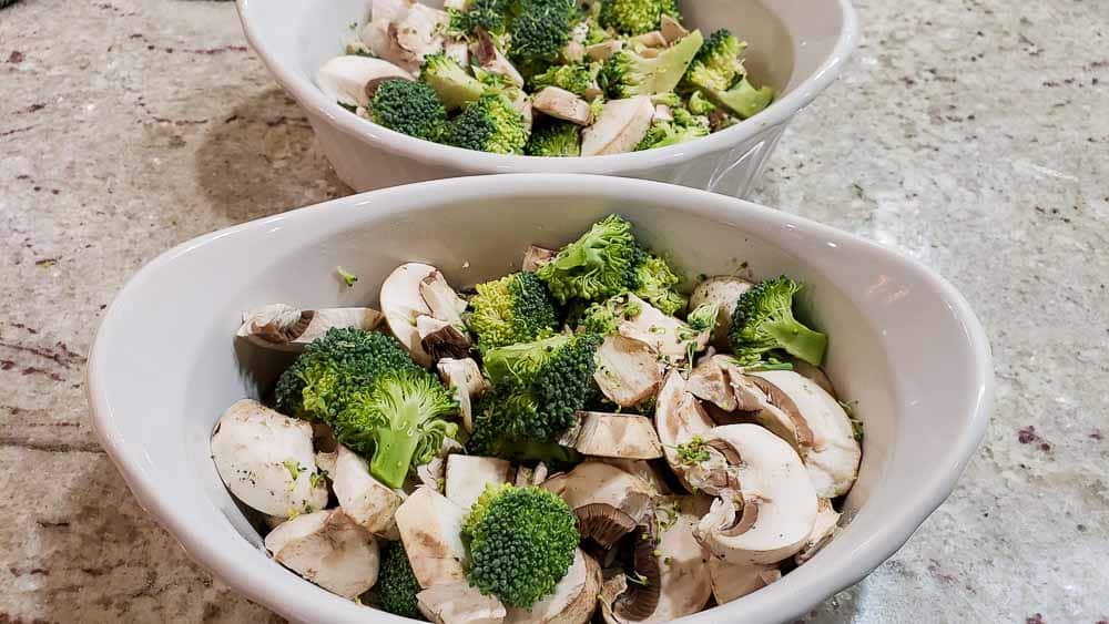 mushrooms and broccoli layered in two dishes.