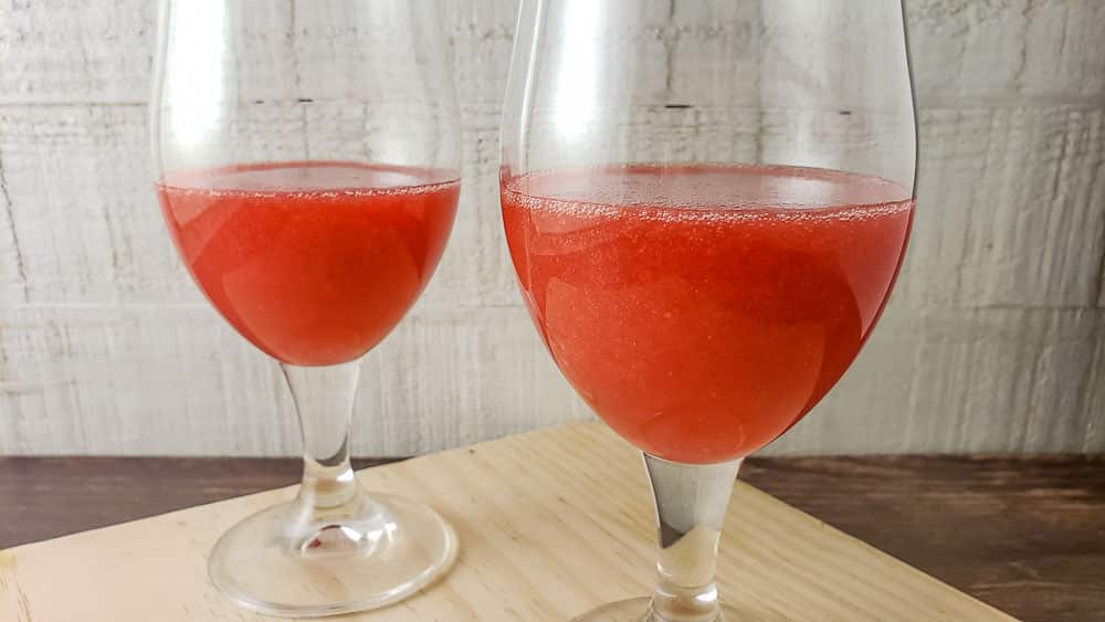 strawberry rum mixture in two glasses
