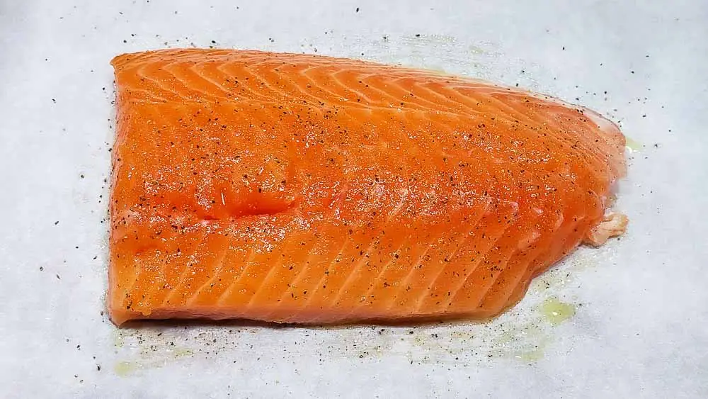 salmon filet sprinkled with salt and pepper.