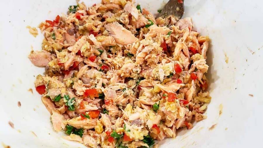 salmon, onion, red pepper, panko crumbs, egg, maoy, worcestershire sauce, garlic salt, and black pepper mixed in a bowl