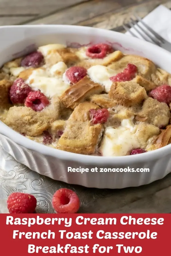 a graphic of Raspberry Cream Cheese French Toast Casserole Breakfast for Two on a tray with a napkin and fork