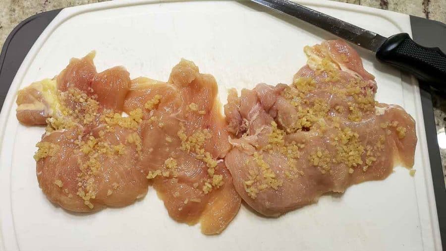 garlic rubbed on 2 chicken filets