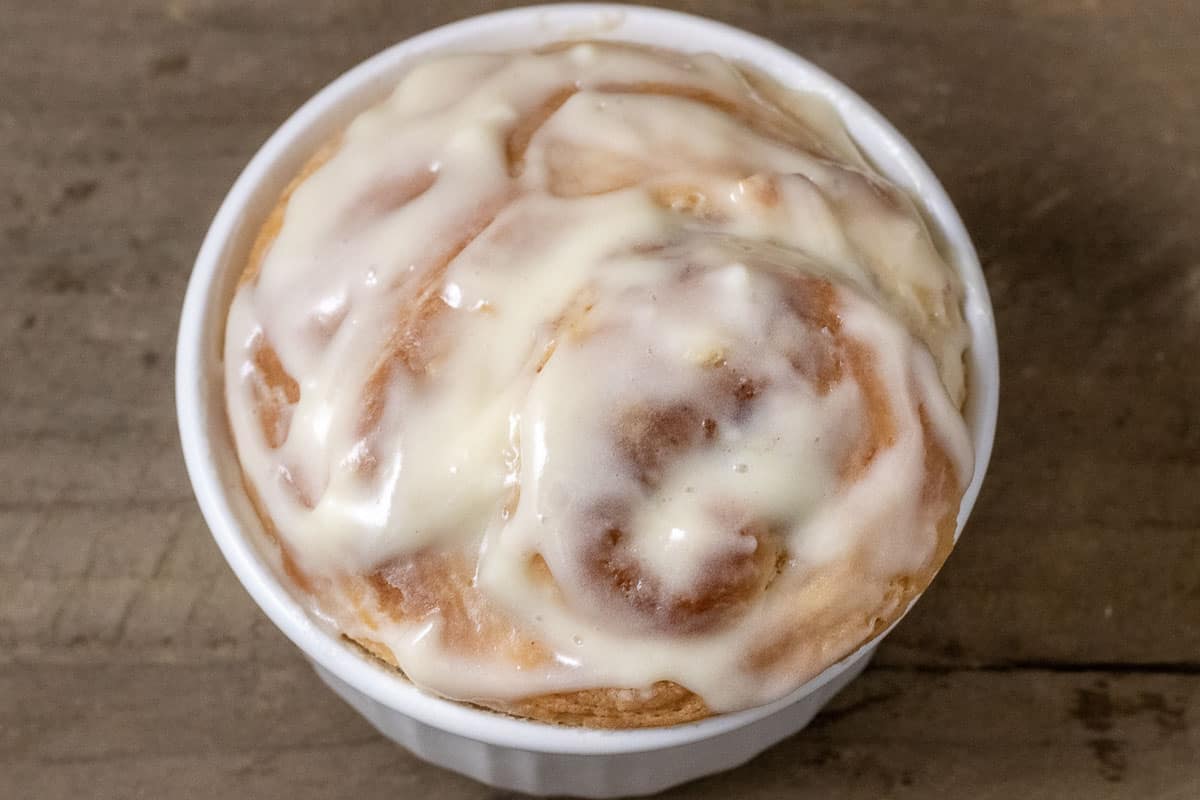 top down view of giant glazed cinnamon roll.
