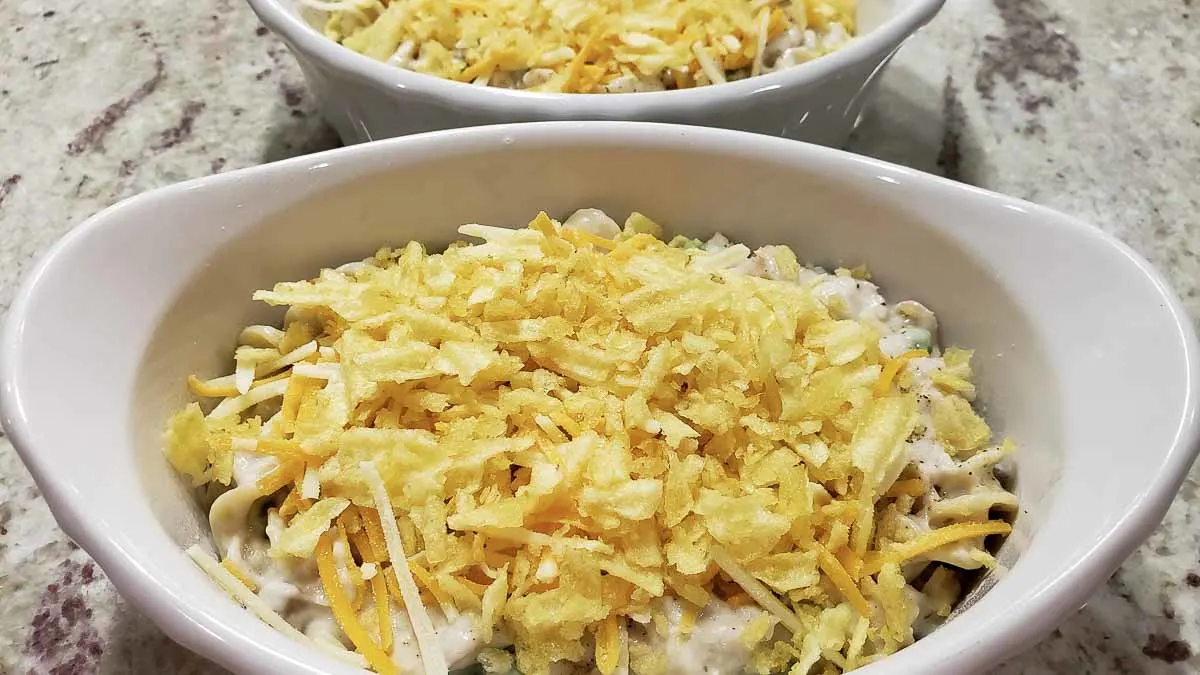 crushed potato chips sprinkled on top of the tuna noodle casseroles.