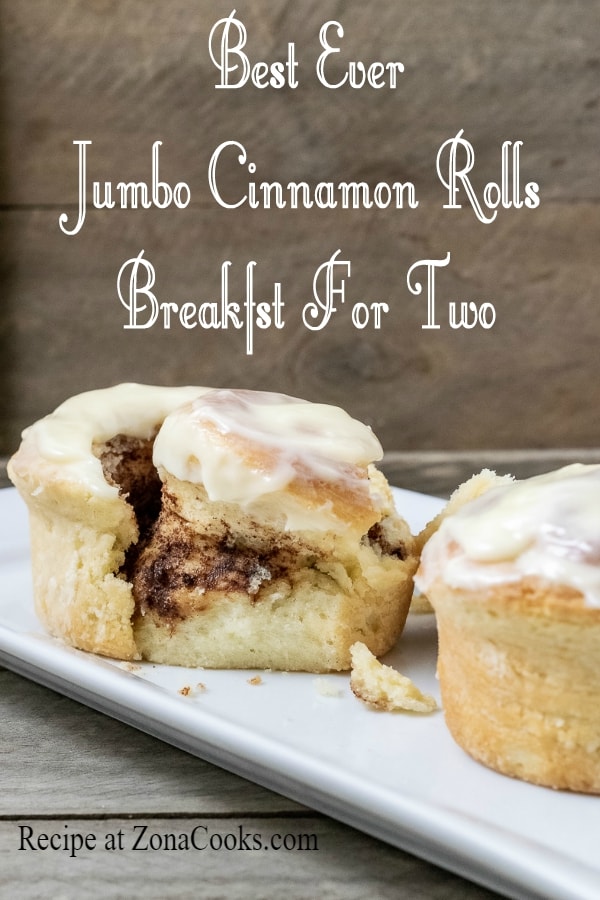a graphic of Best Ever Jumbo Cinnamon Rolls Breakfast For Two on a platter with one roll split open.