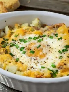 Individual Breakfast Bake casserole on a tray with a side of toast