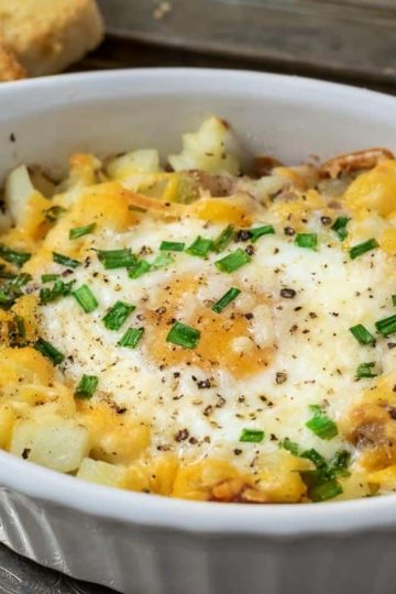 Individual Breakfast Bake casserole on a tray with a side of toast