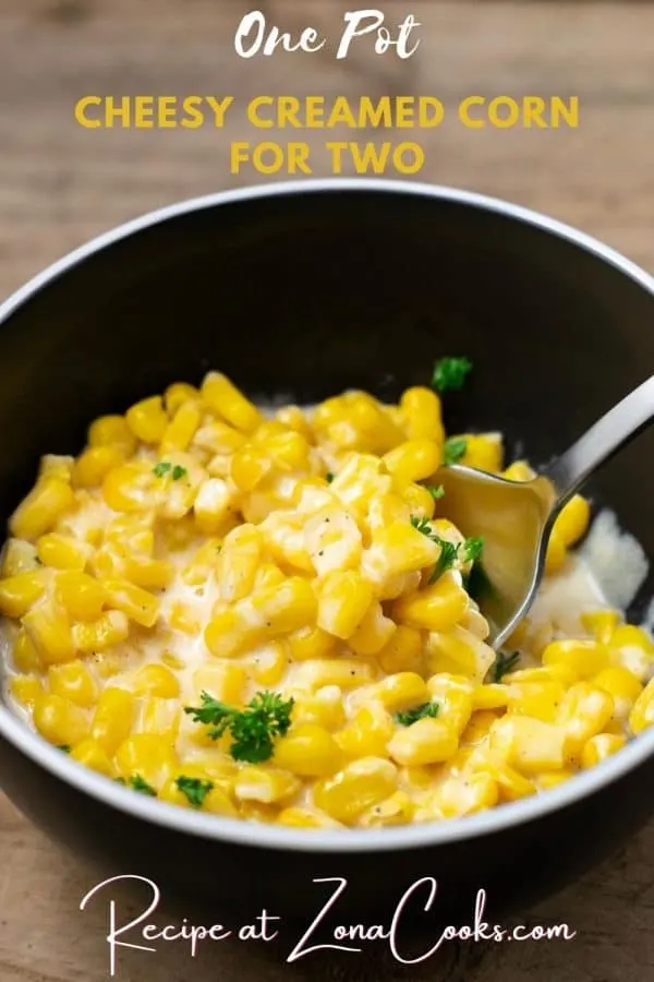 a graphic of One Pot Cheesy Creamed Corn For Two with spoon scooping some corn.