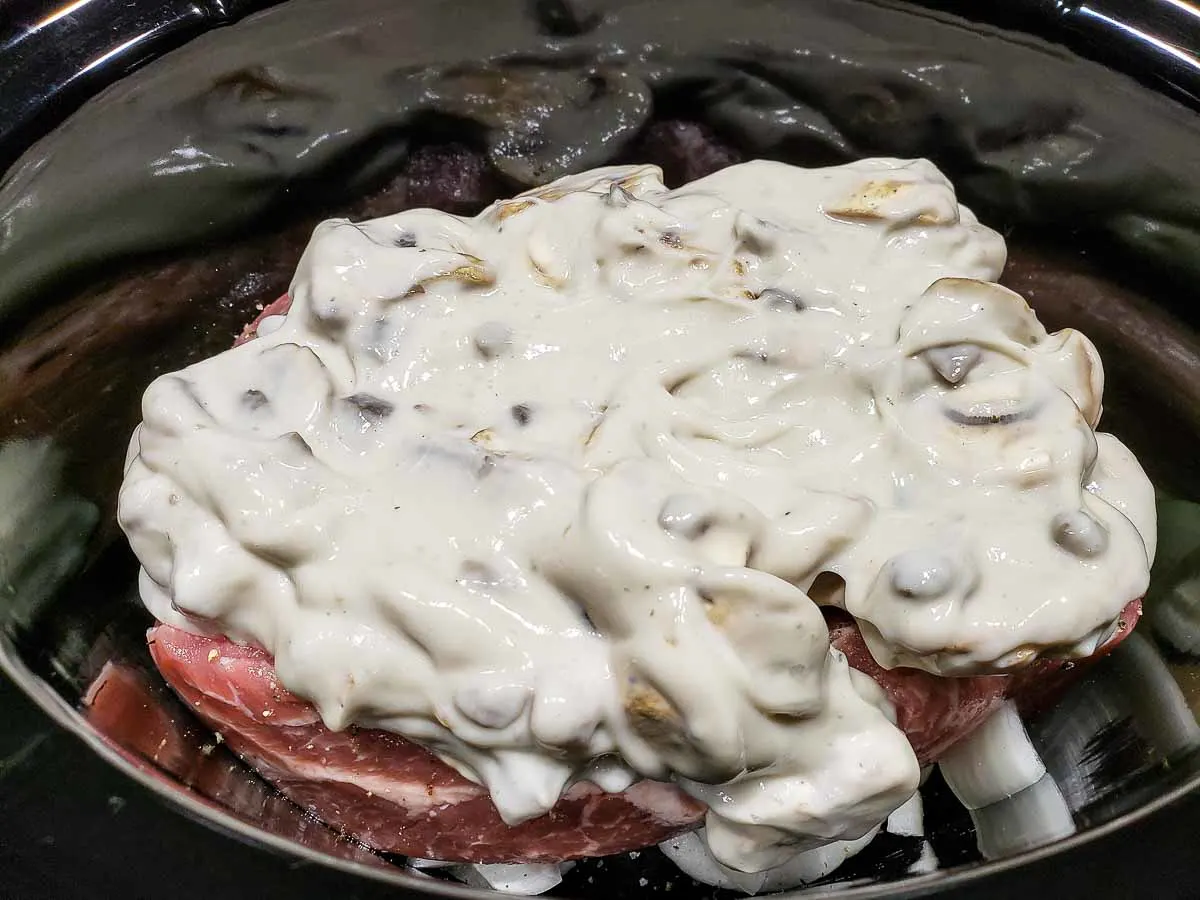 mushroom gravy poured over Crock Pot Pork Country Style Ribs.
