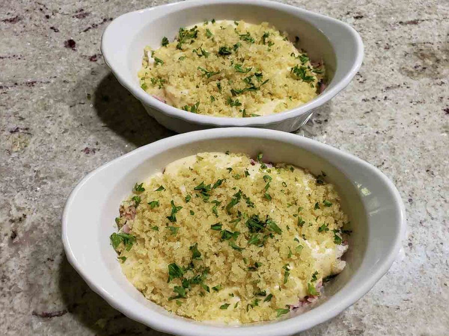 bread crumb mixture and parsley sprinkle over cordon bleu casseroles in baking dishes